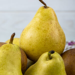 side view of fresh ripe pears on white background